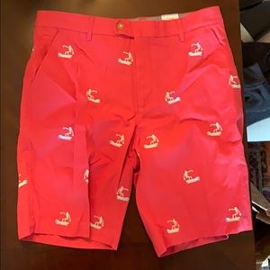 Never worn red shorts with surfing skeletons